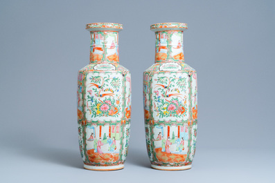 A pair of Chinese Canton famille rose rouleau vases, 19th C.