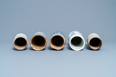 A collection of five Spanish blue and white albarello-type drug jars, 17th C.