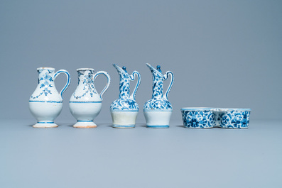 Three blue and white Dutch Delft, Nevers and Rouen wet drug jars and four jugs, 17/18th C.