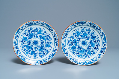 A varied collection of blue and white Dutch Delft plates and vases, 18th C.