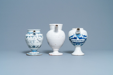 Three blue and white Dutch Delft, Nevers and Rouen wet drug jars and four jugs, 17/18th C.