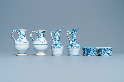 Three blue and white Dutch Delft, Nevers and Rouen wet drug jars and four jugs, 17/18th C.