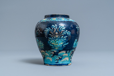 A Chinese fahua vase with mandarin ducks in a lotus pond, Ming