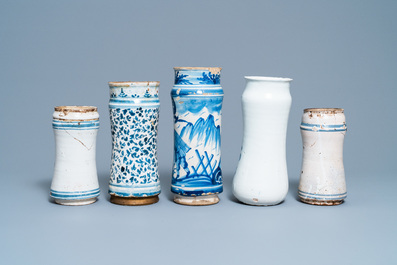 A collection of five Spanish blue and white albarello-type drug jars, 17th C.