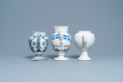 Three blue and white Dutch Delft, Nevers and Rouen wet drug jars and four jugs, 17/18th C.