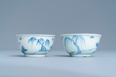 A pair of Chinese blue and white cups and saucers, Ca Mau shipwreck, Kangxi/Yongzheng