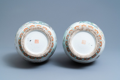 A pair of Chinese famille rose 'phoenix' vases, Tongzhi mark and of the period