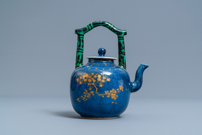 A Chinese powder blue and gilt teapot with verte biscuit handle, Kangxi