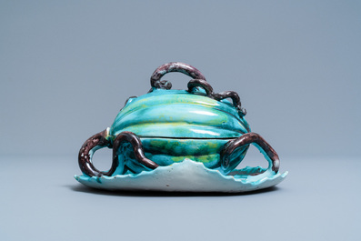 A polychrome Brussels faience melon-shaped tureen on stand, 18th C.
