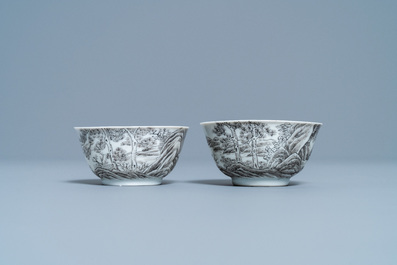 A pair of Chinese grisaille and gilt 'buffalo' cups and saucers, Yongzheng