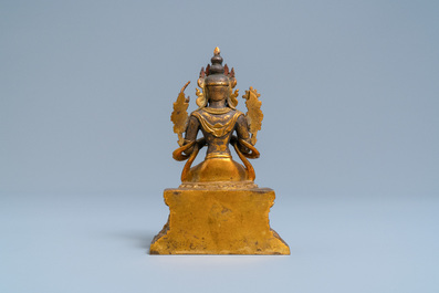 A Chinese gilt bronze figure of Buddha, 18/19th C.