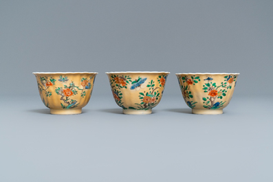 Six lobed Chinese famille verte caf&eacute;-au-lait-ground cups and saucers, Kangxi