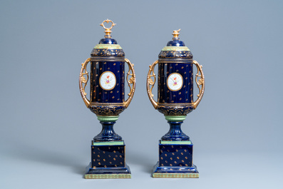 A pair of S&egrave;vres-style vases and covers, prob. Samson, Paris, 19th C.