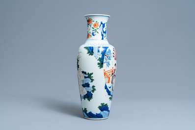 A Chinese wucai vase with continuous figurative design, 19th C.