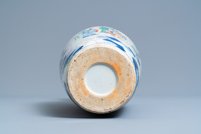 A Chinese wucai vase with continuous figurative design, 19th C.