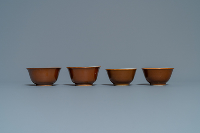 Eight Chinese famille rose, blue and white and iron-red capucin-ground cups and saucers, Kangxi/Qianlong