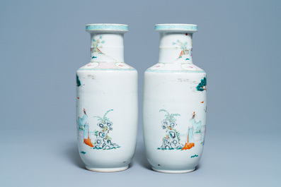 A pair of Chinese famille rose rouleau vases with immortals, 19/20th C.