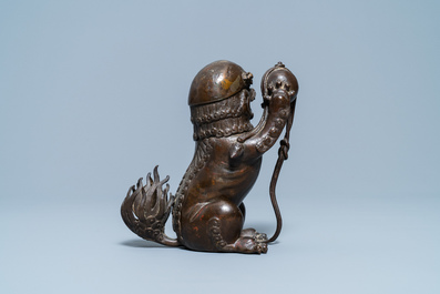 A Chinese lacquered bronze 'Buddhist lion' censer and cover, Ming