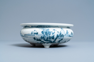 A Chinese blue and white tripod censer with a landscape, Dehua, Kangxi