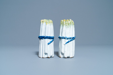 A pair of polychrome Brussels faience asparagus-shaped casters, 18th C.