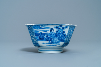 A Chinese blue and white bowl with a lady with cat, Kangxi mark and of the period