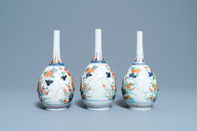 Three Japanese Imari bottle vases with molded panels, Edo, 17/18th C.