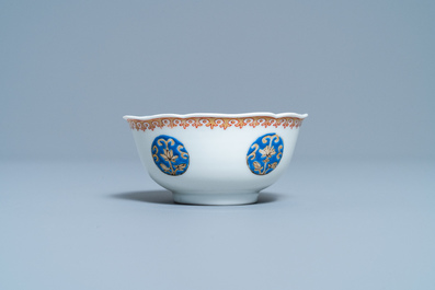 Une tasse et soucoupe en porcelaine de Chine famille rose &agrave; d&eacute;cor de Liu Hai, Yongzheng