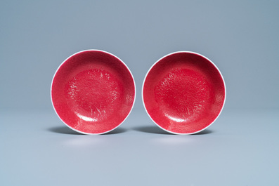 A pair of Chinese monochrome ruby red saucers, Jiaqing mark and of the period