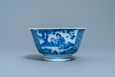 A Chinese blue and white bowl with a lady with cat, Kangxi mark and of the period