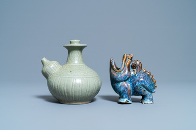 A Chinese celadon-glazed kendi and a Shiwan flamb&eacute;-glazed beast-shaped censer, 18/19th C.