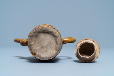 A Chinese brown-glazed relief-decorated teapot and cover, 18/19th