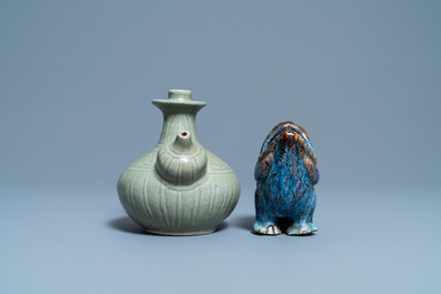 A Chinese celadon-glazed kendi and a Shiwan flamb&eacute;-glazed beast-shaped censer, 18/19th C.