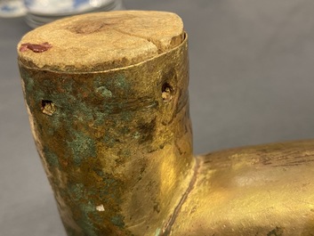 A Tibetan gilt bronze and copper alloy arm of Buddha, Ming