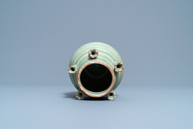 A Chinese Longquan celadon five-spouted urn, Song