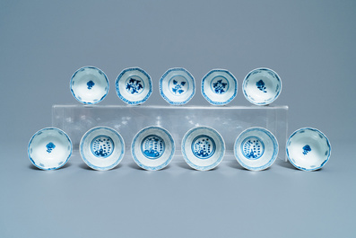 A collection of Chinese blue and white cups and saucers, 19th C.