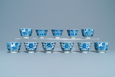 A collection of Chinese blue and white cups and saucers, 19th C.