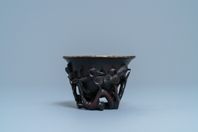 A Chinese zitan wood and silver libation cup, 17th C.