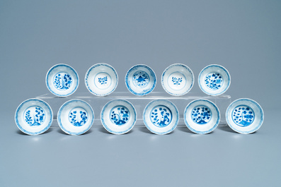 A collection of Chinese blue and white cups and saucers, 19th C.