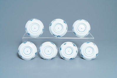 A collection of Chinese blue and white cups and saucers, 19th C.