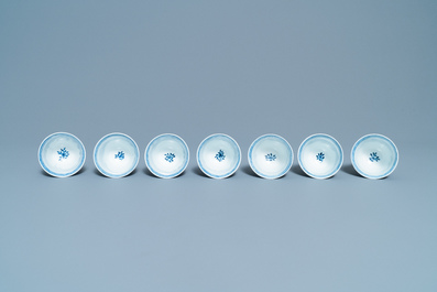 A collection of Chinese blue and white cups and saucers, 19th C.