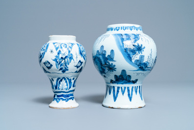 Four Dutch Delft blue and white 'peacock feather' plates and two vases, 18th C.