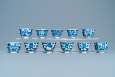 A collection of Chinese blue and white cups and saucers, 19th C.