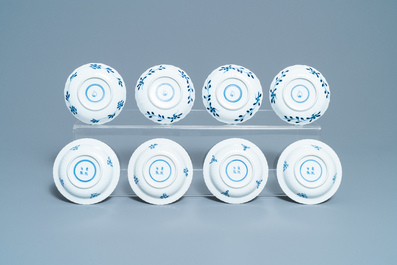 A collection of Chinese blue and white cups and saucers, 19th C.