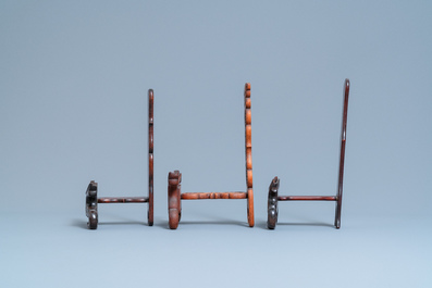 Eight Chinese carved wooden stands for dishes, 19/20th C.