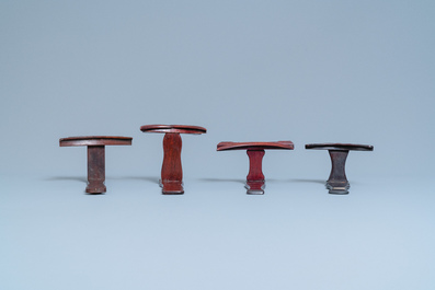 Eight Chinese carved wooden stands for dishes, 19/20th C.