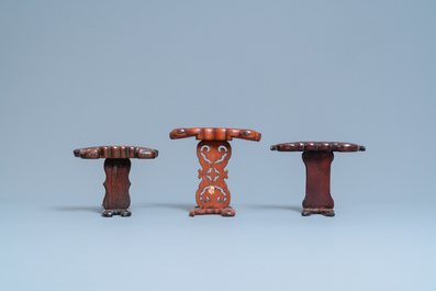 Eight Chinese carved wooden stands for dishes, 19/20th C.