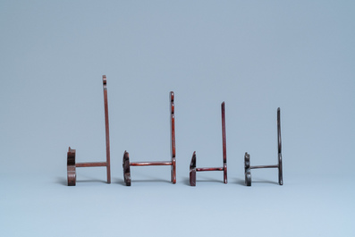 Eight Chinese carved wooden stands for dishes, 19/20th C.