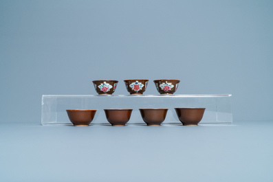 Sixteen Chinese famille rose capucin-ground cups and saucers, Qianlong