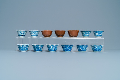 A large collection of Chinese blue and white cups and saucers, Kangxi/Qianlong