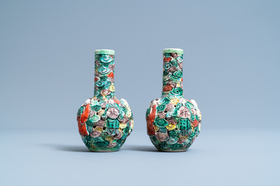 A pair of Chinese reticulated famille verte bottle vases, 19th C.